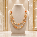 Collier double rang en agate pêche facettée et plaqué or 18 carats