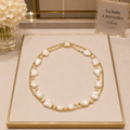Collier Nacre Naturelle Double Rang 46 cm – Perles de Coquillage et Chaîne Plaquée Or 18 Carats