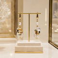 Boucles d’oreilles florales en vermeil, nacre et verre soufflé – Bijou bohème chic ✨