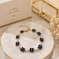 Bracelet Luxe Fleurs Bleues & Perles de coquillages– Cristaux Bleus et Plaqué Or