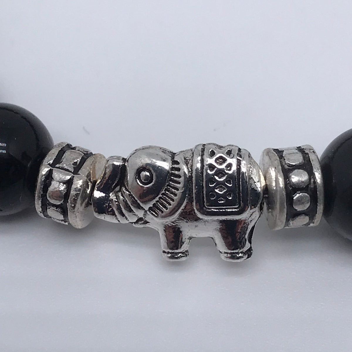 Bracelet obsidienne noire et éléphant 1032