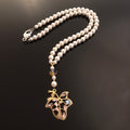 Collier en perles de cultures pendentif feuille joaillerie 2082